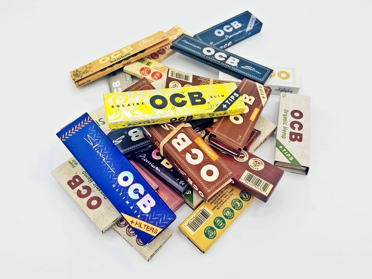 OCB rolling paper packs in assorted styles and materials